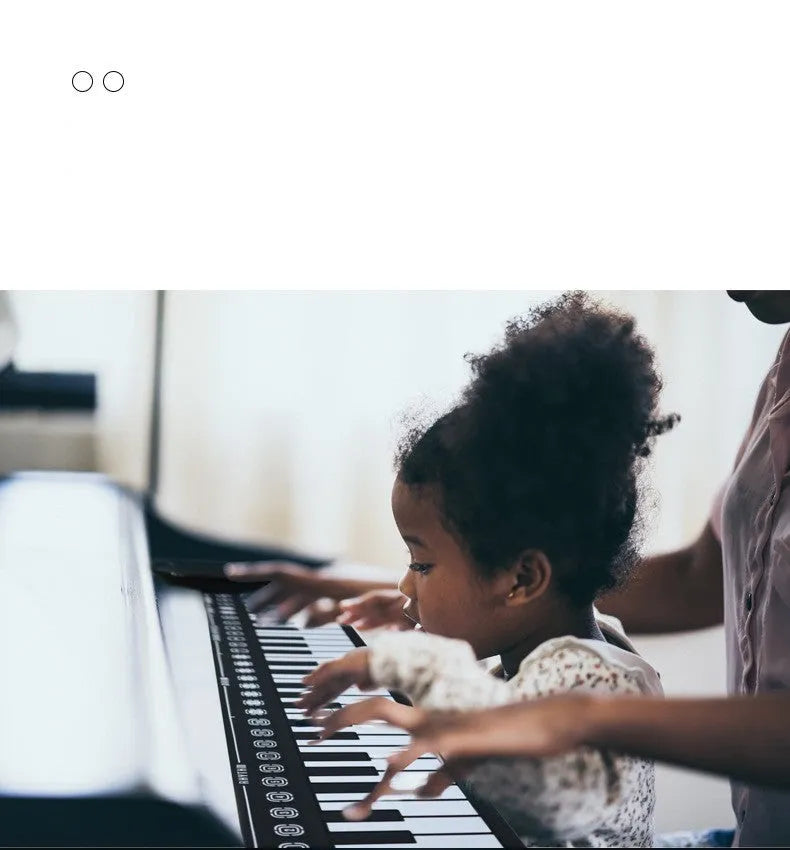 49 key portable folding electronic keyboard in pearl white with silicone keyboard surface and built-in speaker