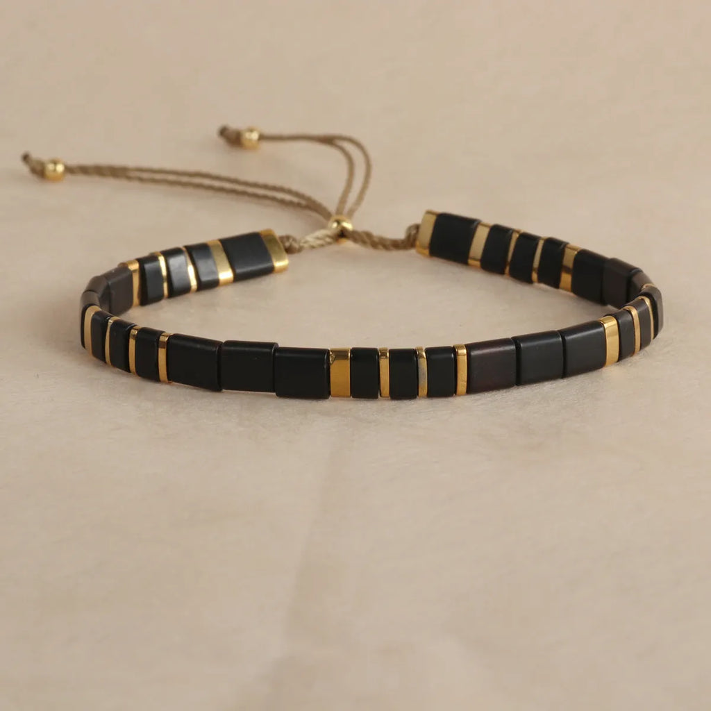 Geometric glass bead bracelet in round design with coloured glaze accents
