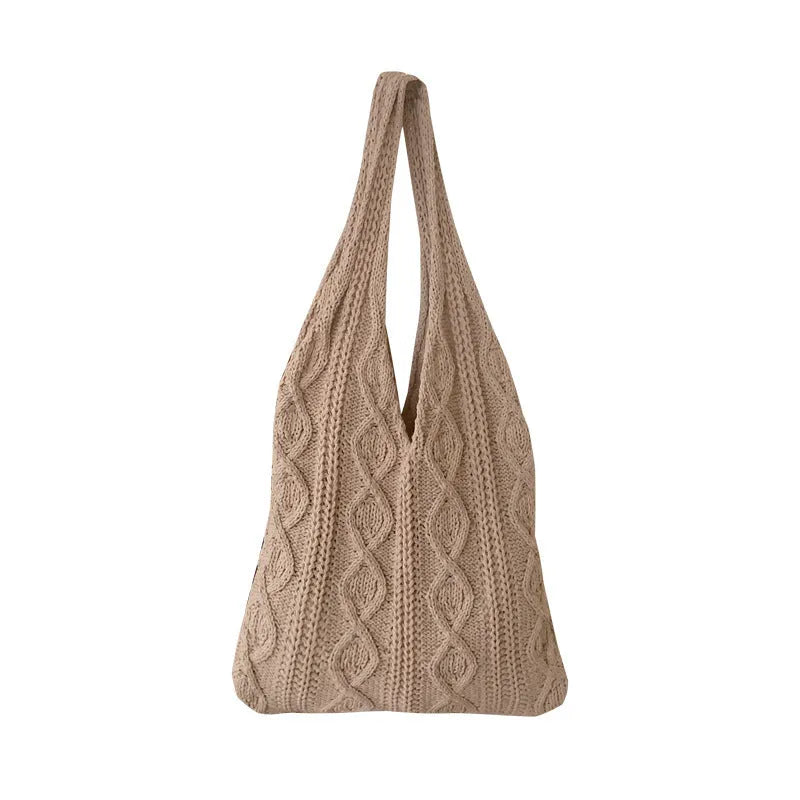 Retro hollow knitted wool yarn women's shoulder tote bag in solid colour showing double straps.