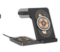Black foldable desktop wireless charging stand with three charging positions, night light, and USB-A port on a desk