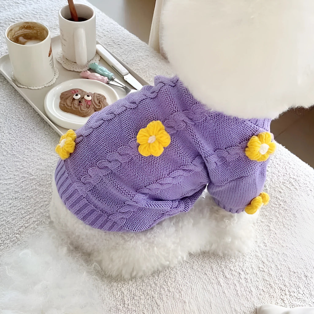Purple knitted flower print dog coat on a pet showing pull-on style
