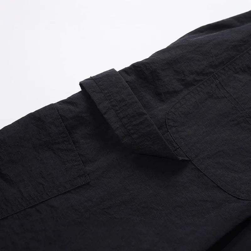 Men's black baggy paratrooper pants with elastic drawstring waist, three-dimensional cutting, acetate fibre blend