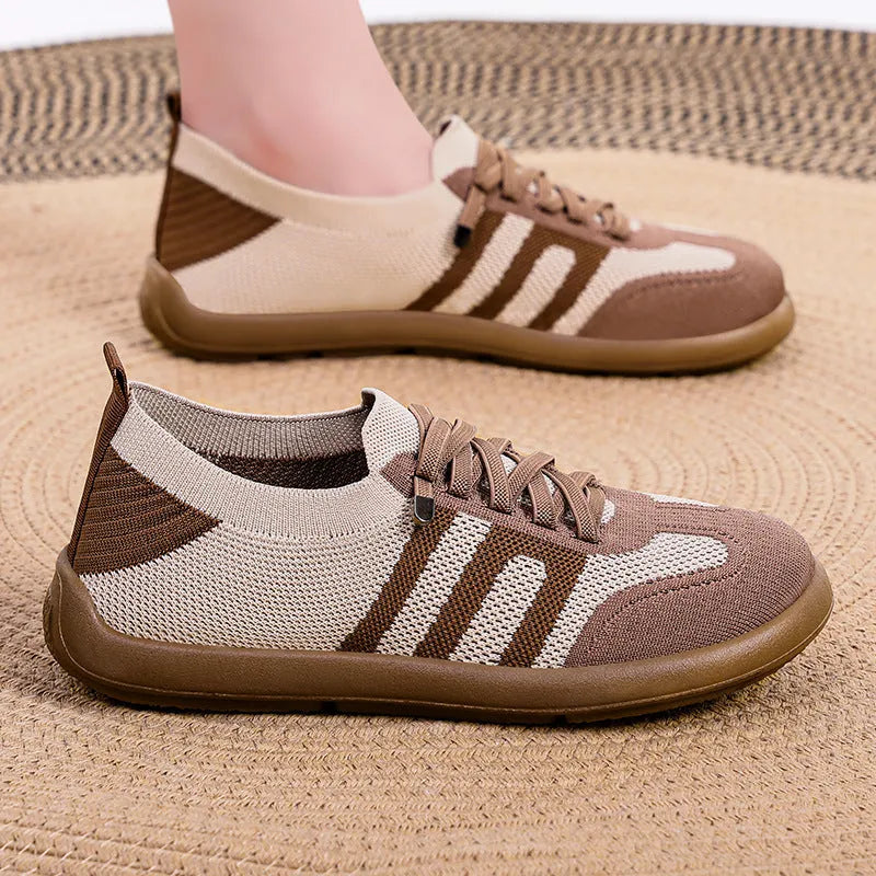 Retro German training shoes in camel with flyknit upper, polyurethane sole, and front lace-up closure