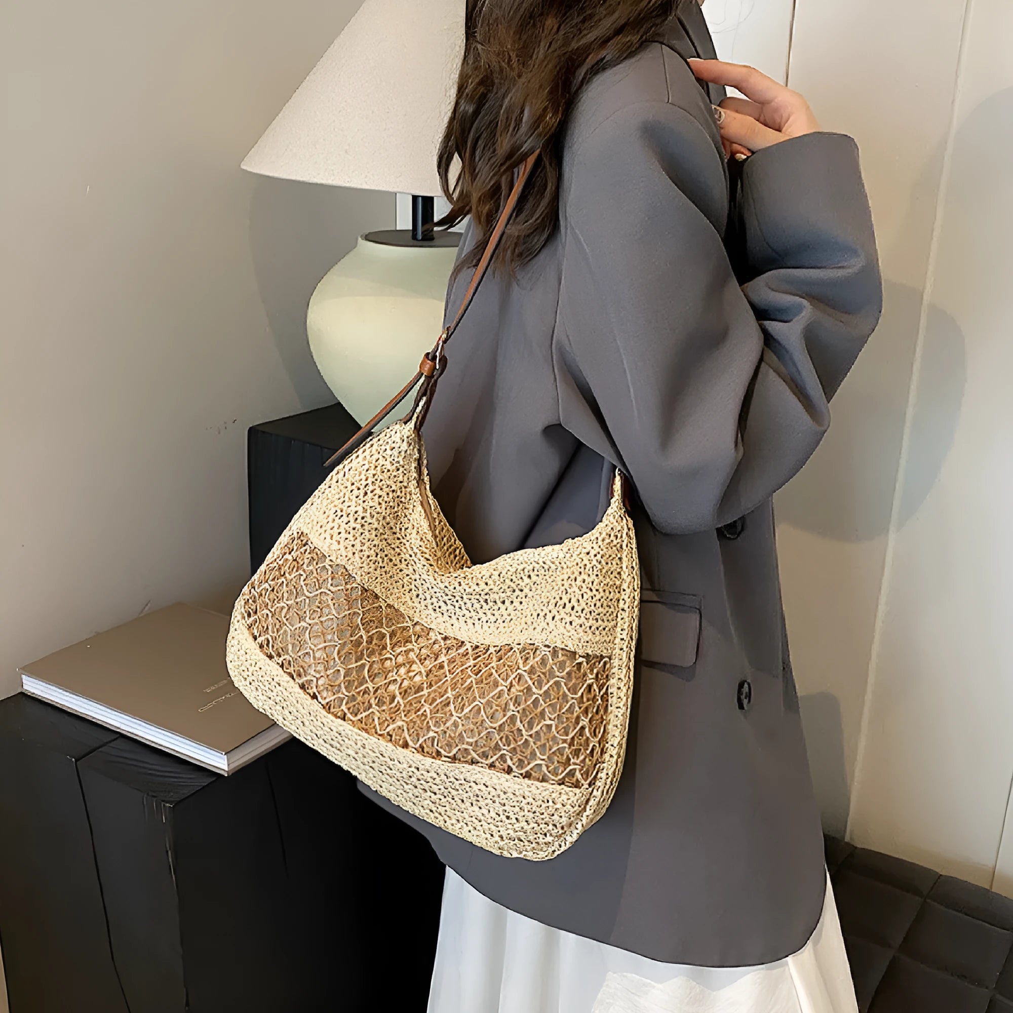 Women's casual straw cross body bag in khaki colour with a cross body strap and outer pocket.