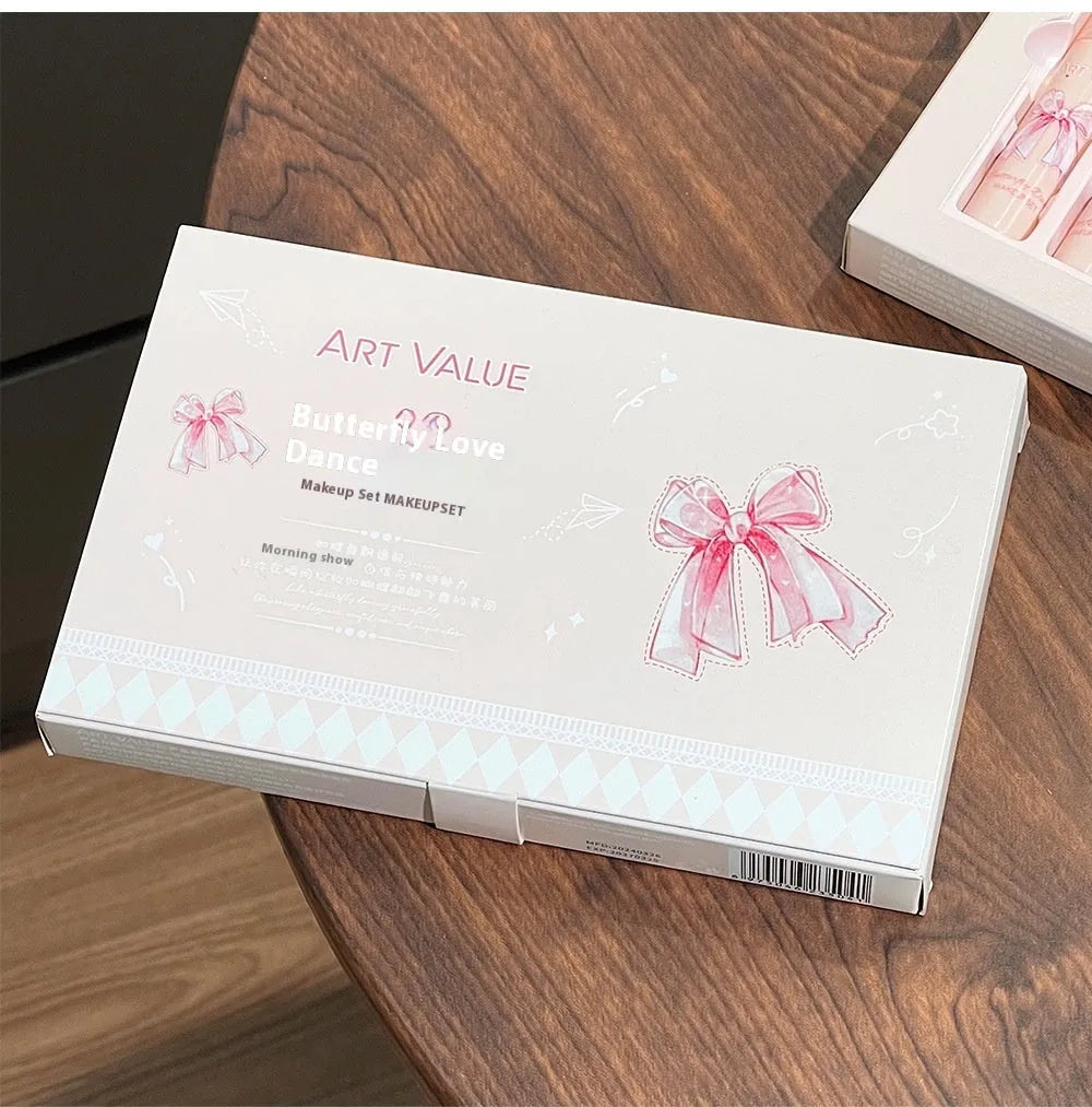 Butterfly Box pink makeup set with four lip mud products, powder blusher and necklace