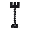 Pet photography tool with black plastic phone clip and snack holder for dog selfies