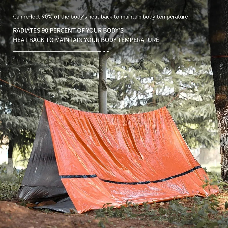 Portable orange disaster relief tent with sleeping bag and raincoat emergency shelter system