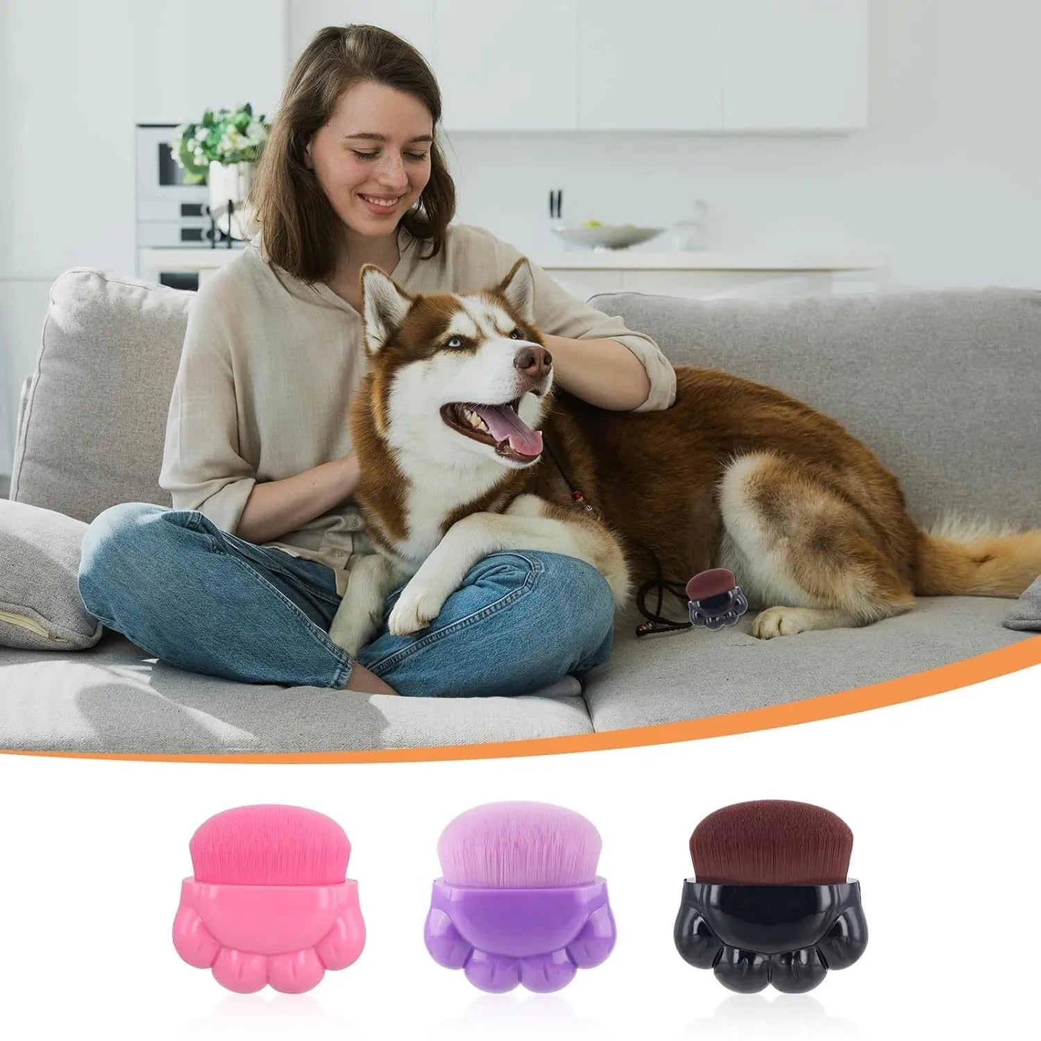 Three dog paw balm brushes with soft fibre heads and paw-shaped plastic handles, each in a small clear storage box