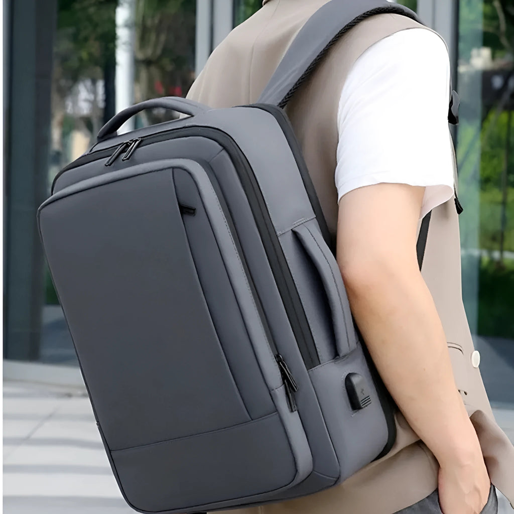 Waterproof black Oxford cloth business backpack with curved shoulder straps and 20-35L capacity