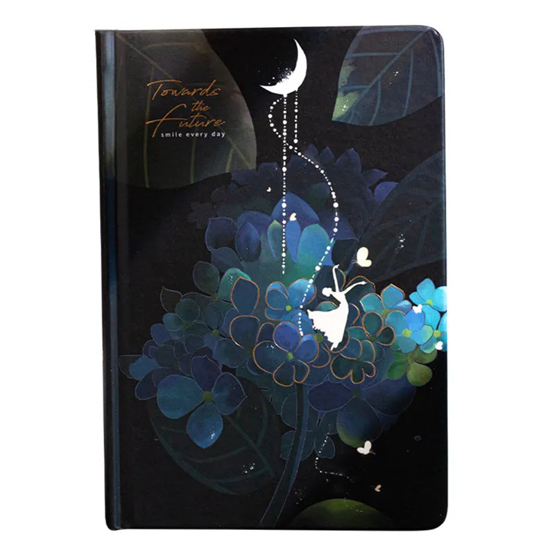 A5 notebook with luminous colourful illustration cover shown in deep blue, gold, light blue, and purple colour options.