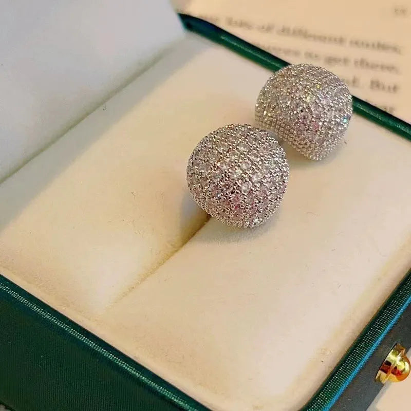 Women's geometric drop-shaped gold earrings with full diamond little golden beans design and spherical elements