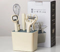Six-piece white stainless steel kitchen gadget set with modern simplicity design on a clean surface
