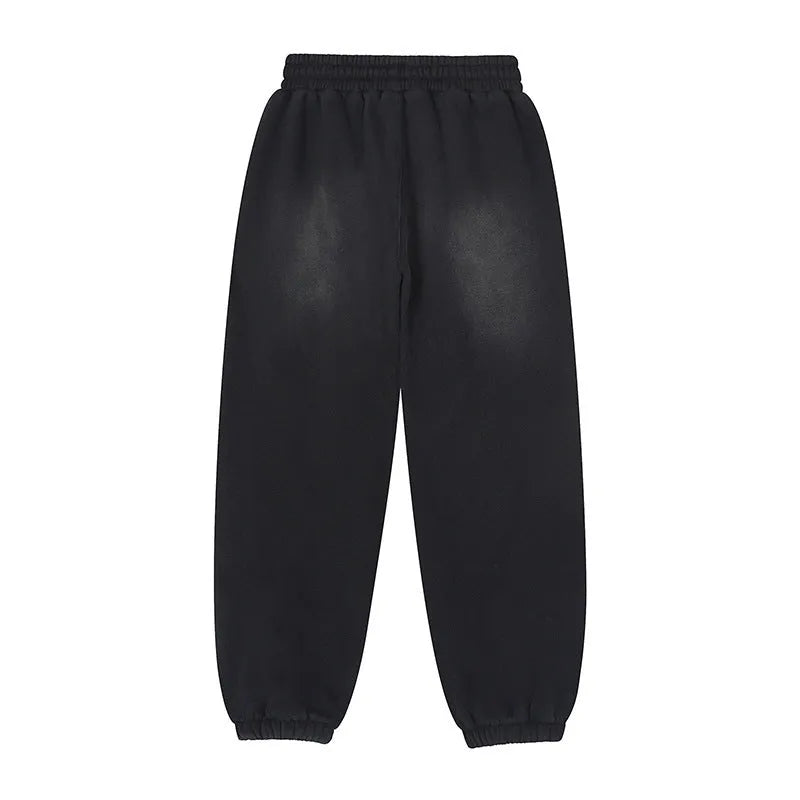 Black men's loose cotton sports sweatpants with wool lining, straight leg style