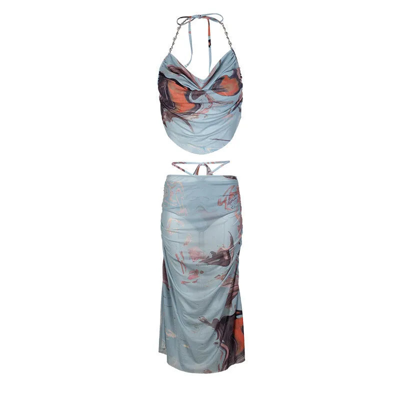Blue women's three-piece bikini set with diamond chain detail and brief-style bottom.