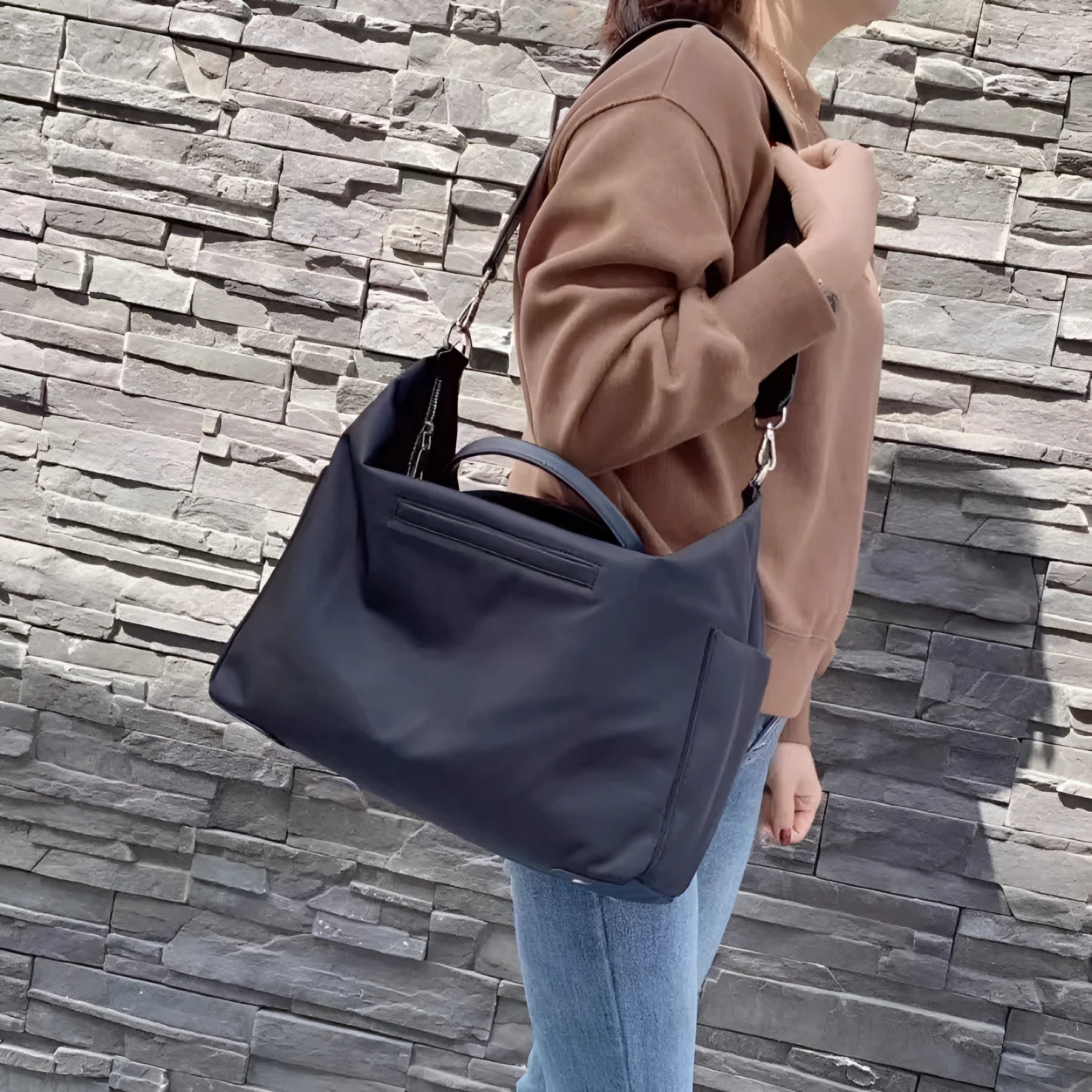 Nylon waterproof cloth shoulder bag with large 35x14x27cm capacity in black, simple design, front view