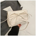 Women's black PU leather underarm bag with horizontal square design and crossbody strap