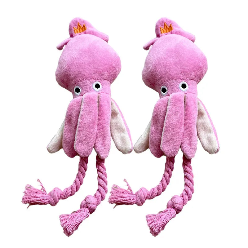 Pink squid-shaped plush dog chew toy with squeaky whistle, corduroy fabric, 32cm body length