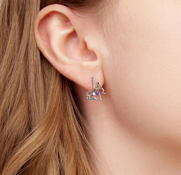 925 silver butterfly stud earrings with moonstone inlay on a white background