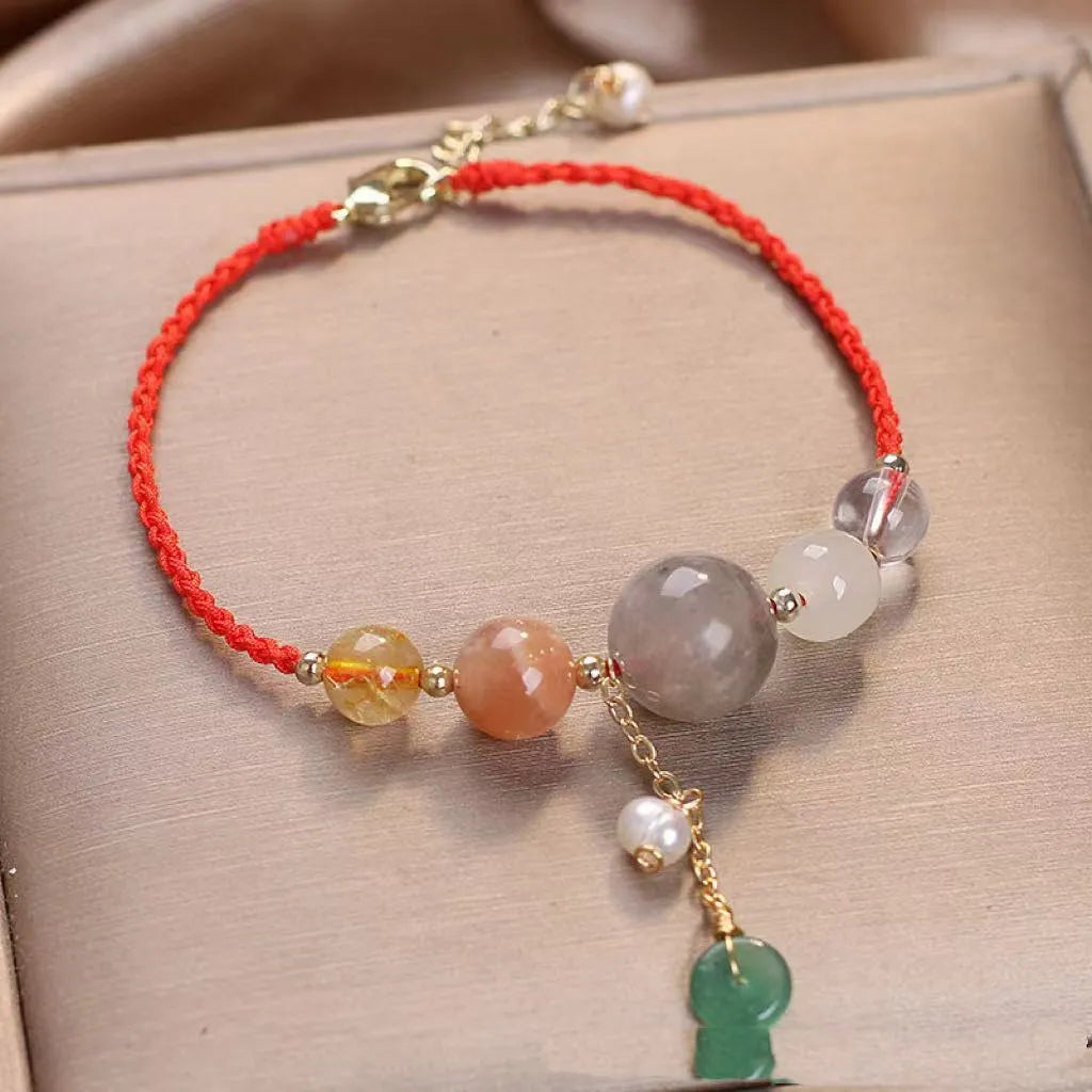 Hand-woven crystal peace buckle bracelet for women with sequins in red, green, and blue colours