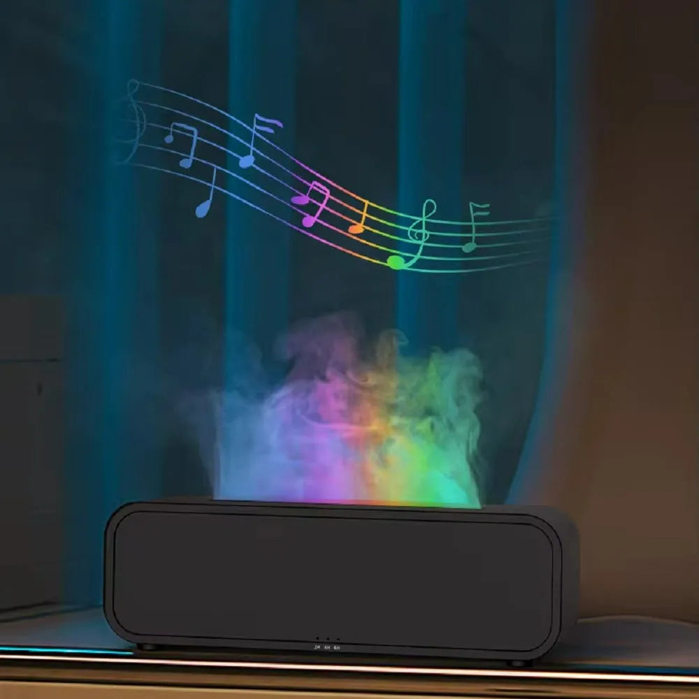 Black aroma diffuser with glowing orange flame effect and colour-changing LED base on a wooden table