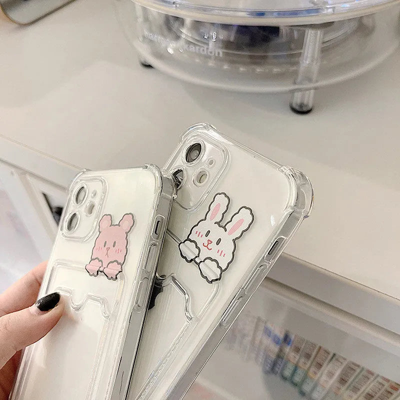 Transparent cartoon design iPhone case with integrated card holder slot for Apple iPhone models.