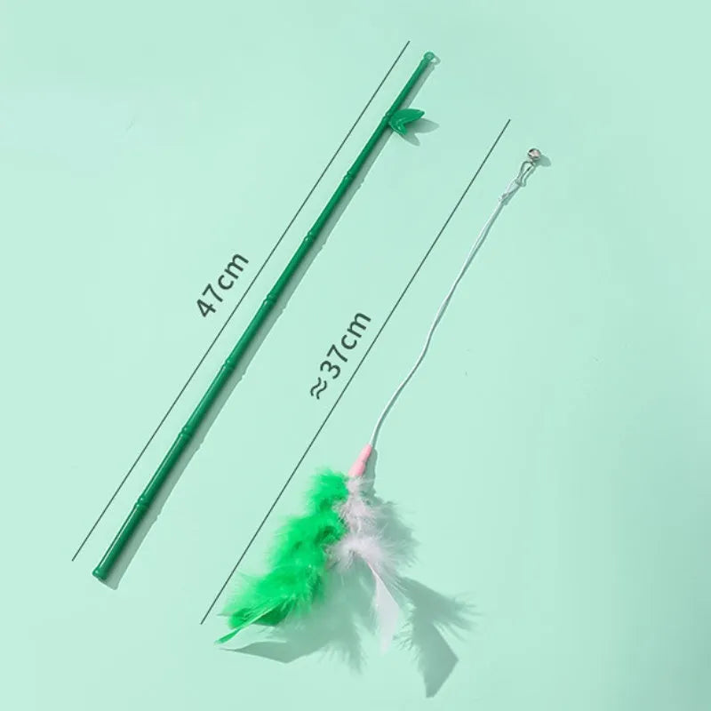 Interactive cat toy feather wand with green bells and feathers on a durable wand