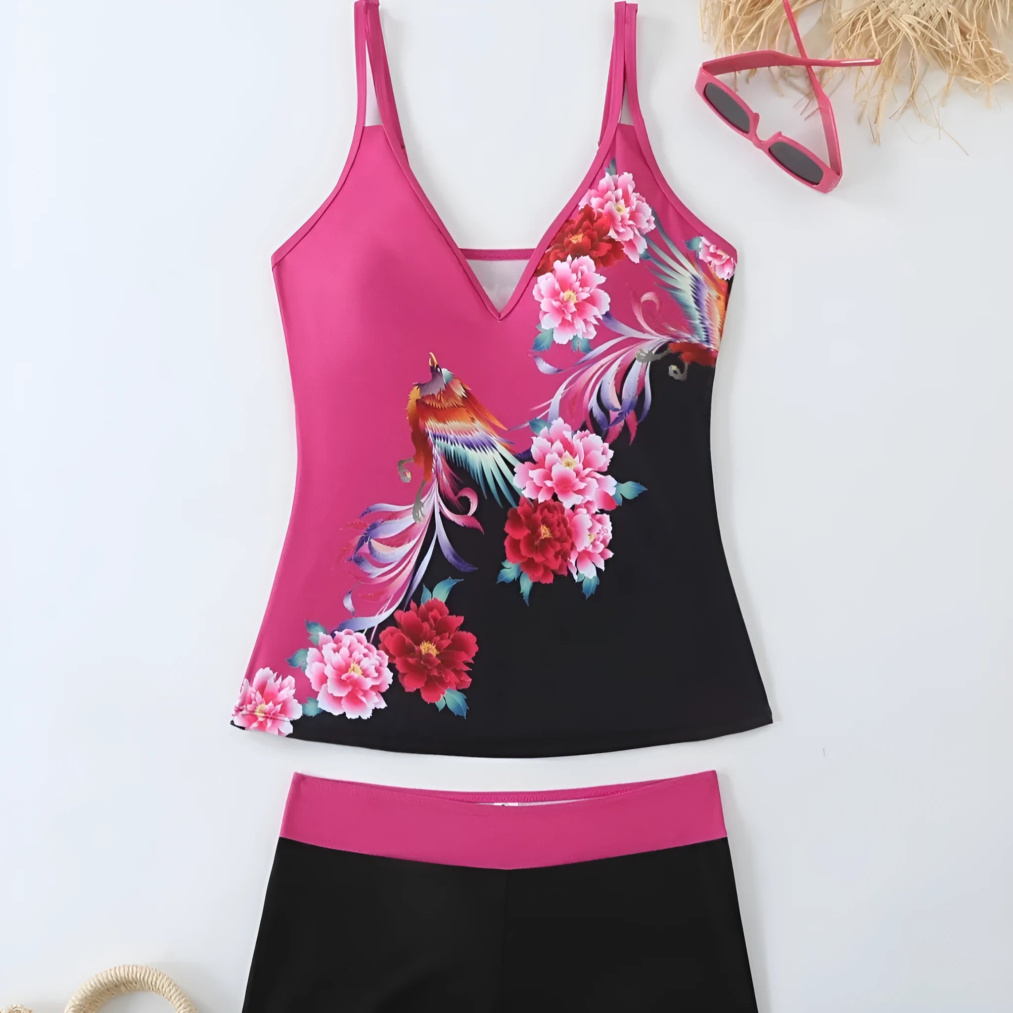 Plus size women's printed two-piece swimsuit in black or rose red with briefs style bottom.