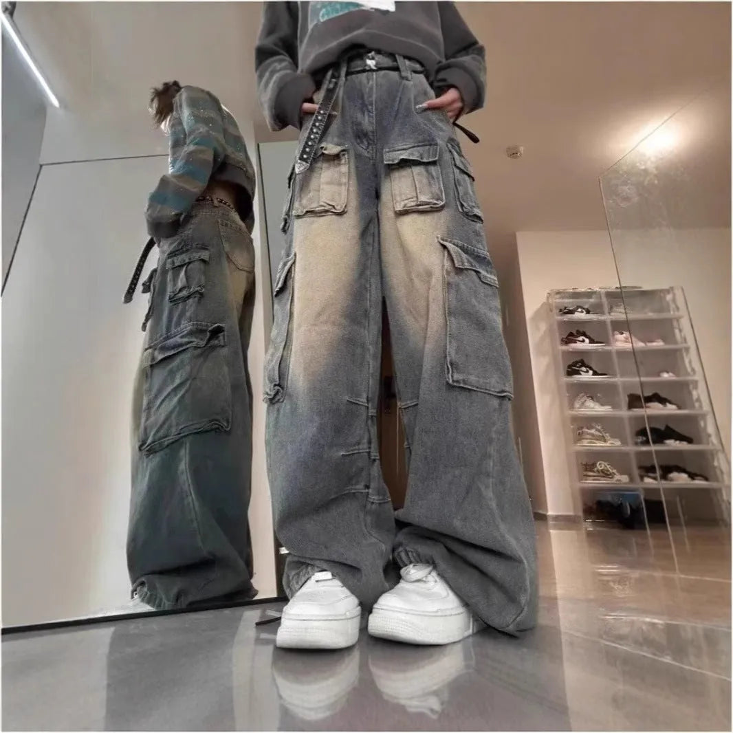 Loose-fit straight-leg jeans with multiple pockets in distressed light blue denim