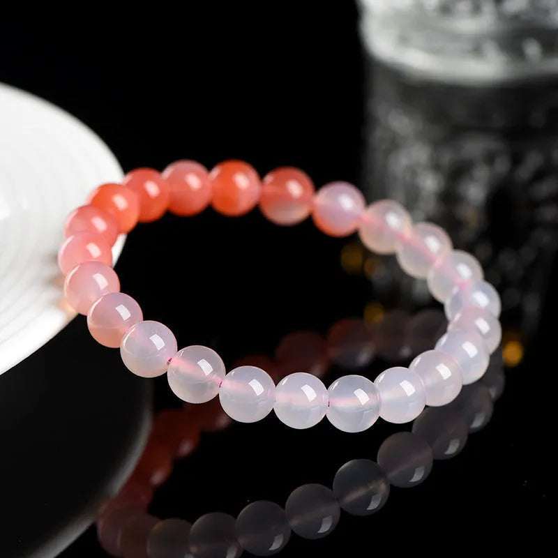 Natural gradient Yanyuan agate bracelet in a unisex geometry style on a wrist.