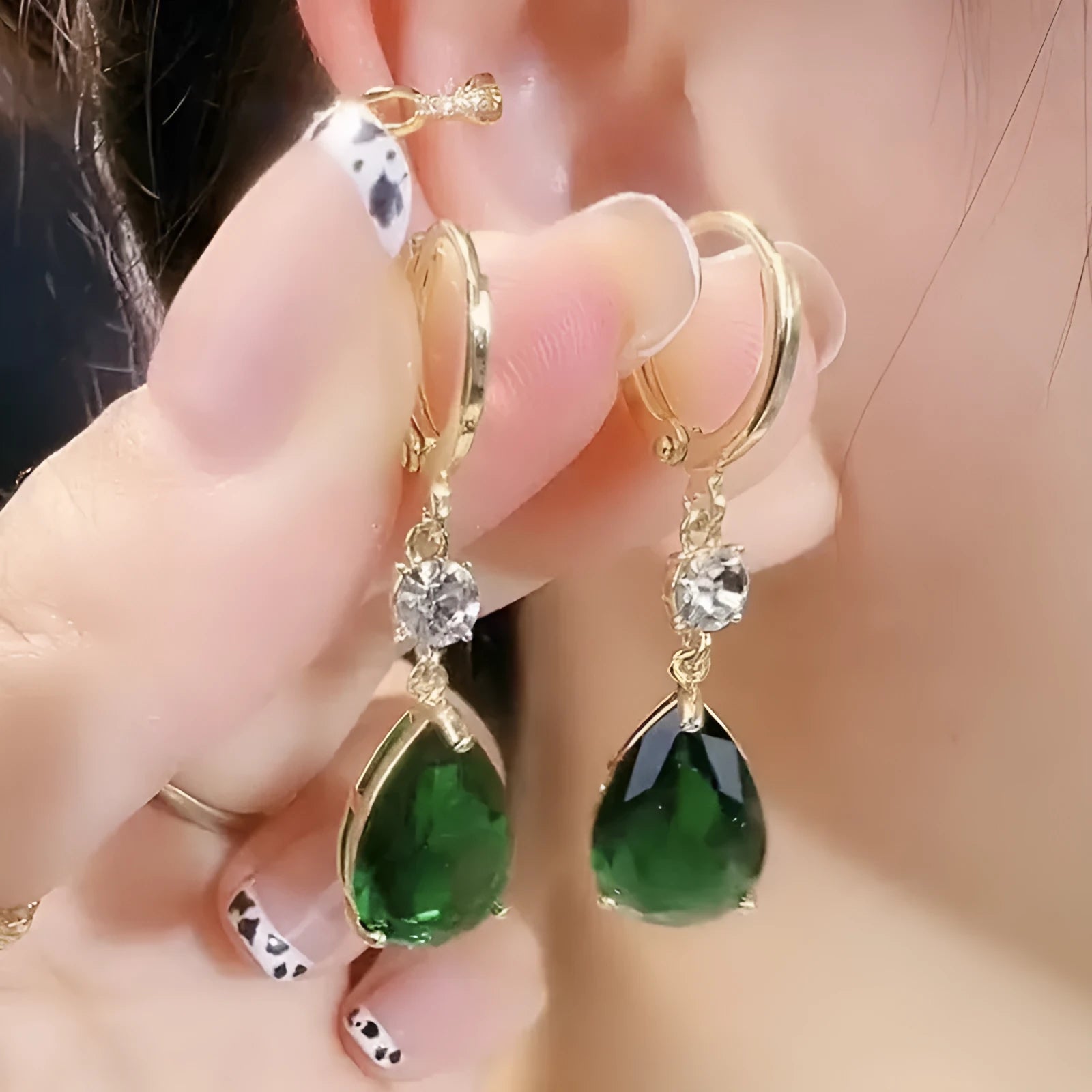 Geometric teardrop earrings in emerald green colour with alloy construction