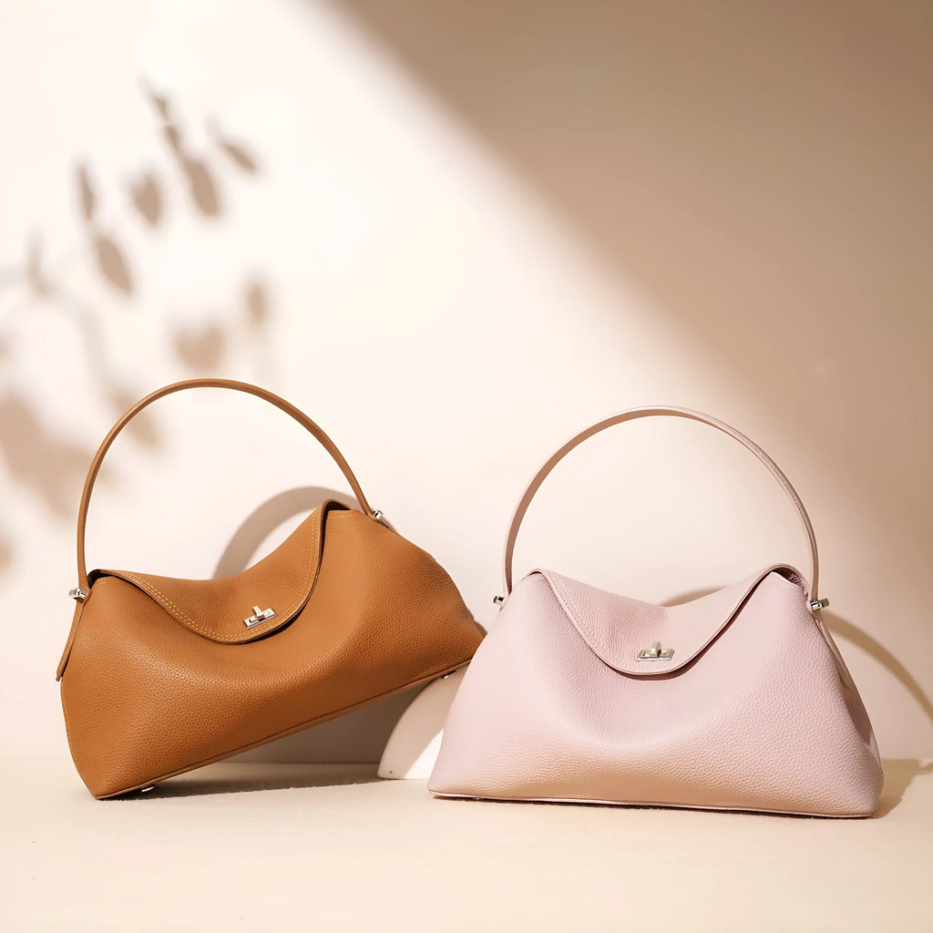 First layer cowhide leather shoulder messenger bag in pillow shape, golden brown colour, with double shoulder strap and open pocket