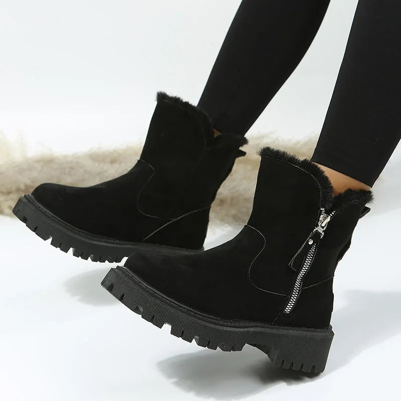 Women's black high-top snow boots with faux suede upper, side zipper, and thick plush lining.