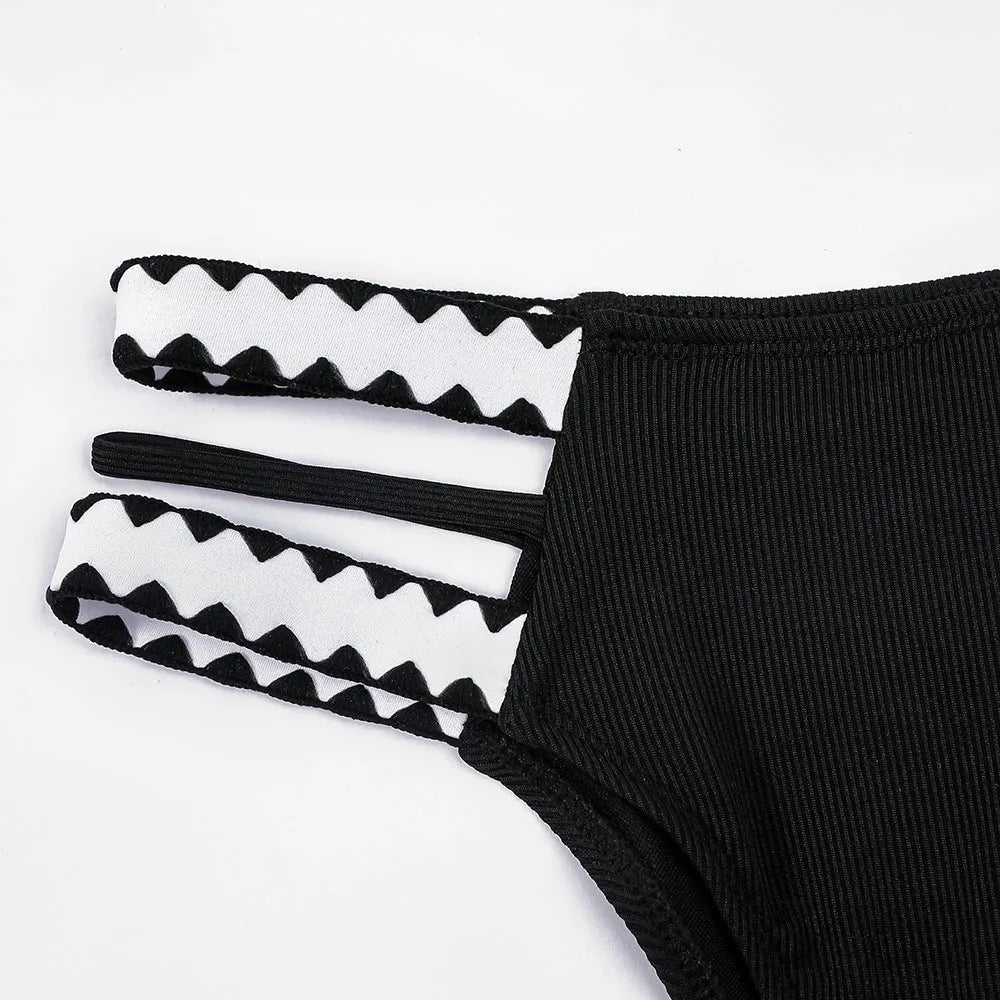 Women's black polyester hollowed-out split swimsuit for swimming and wading