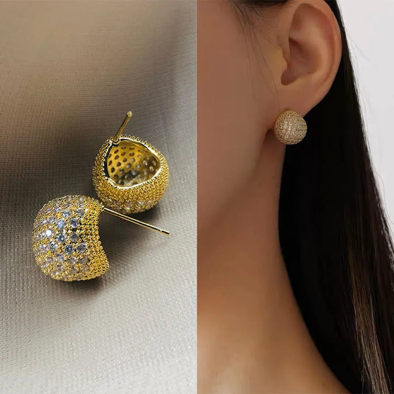 Women's geometric drop-shaped gold earrings with full diamond little golden beans design and spherical elements