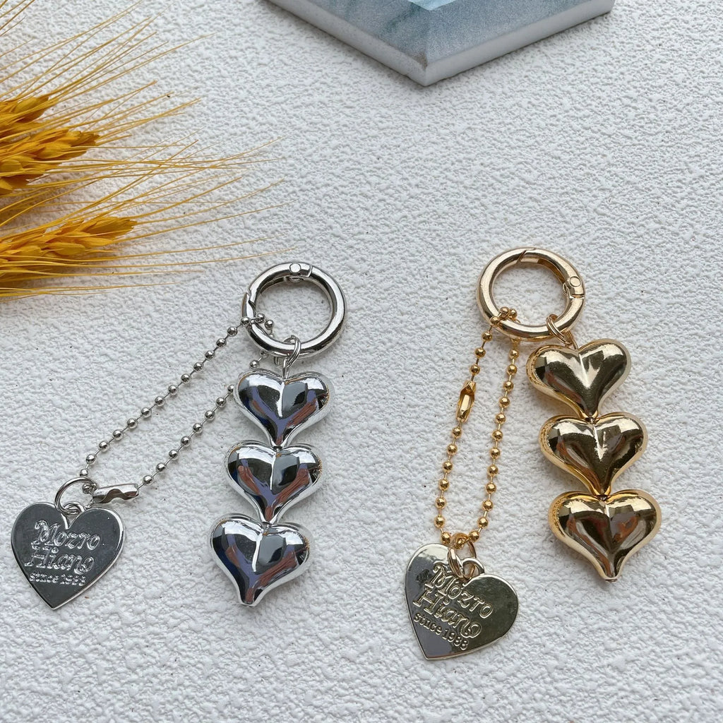 Acrylic Love Heart key ring with electroplated finish in metallic gold colour on a keychain