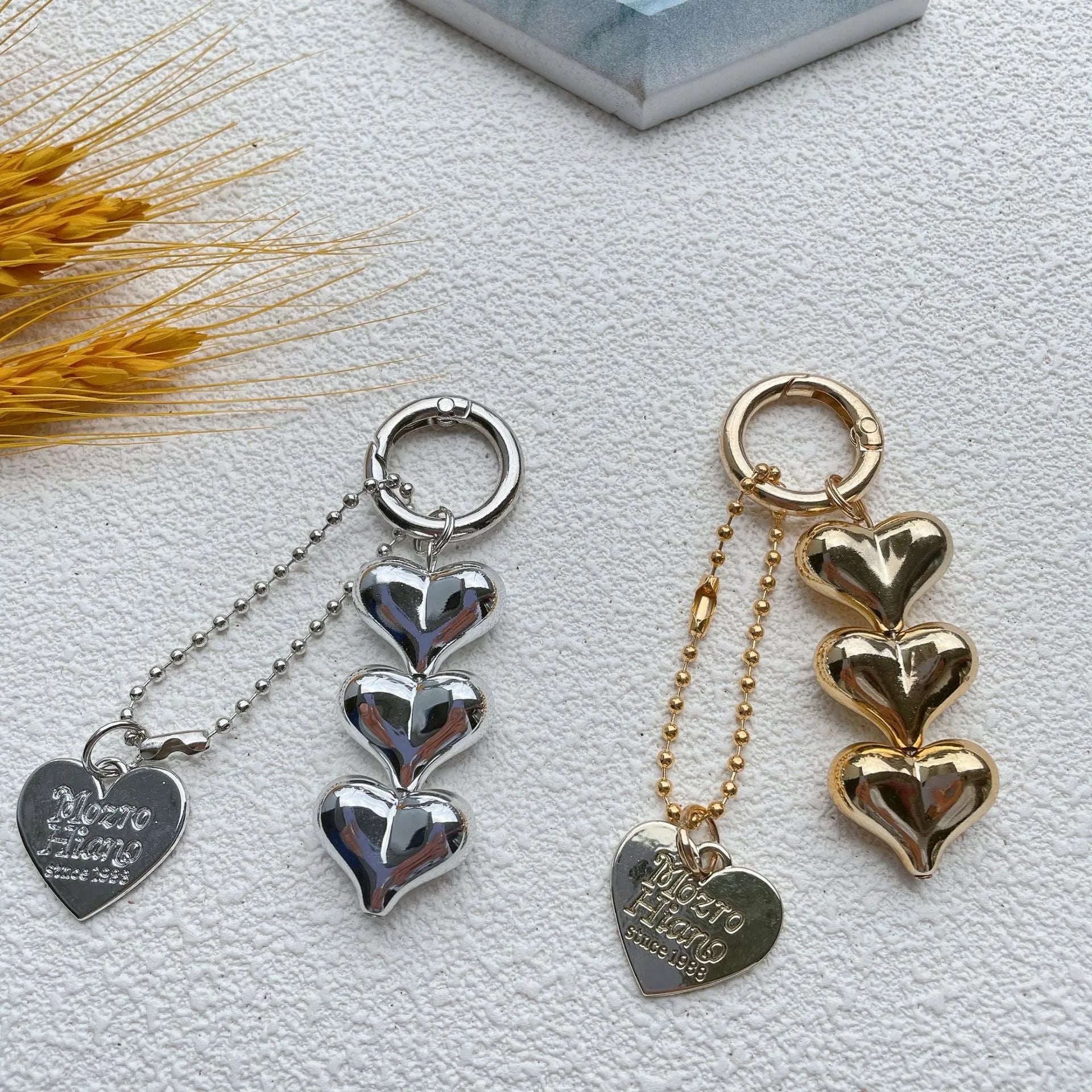 Acrylic Love Heart key ring with electroplated finish in metallic gold colour on a keychain