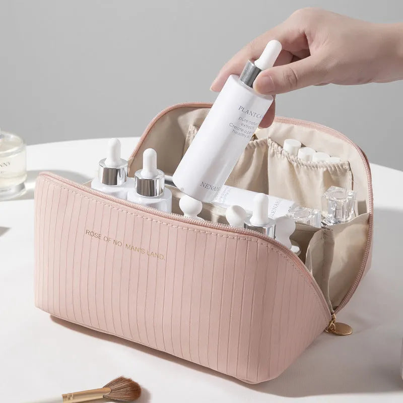 Vertical pattern makeup bag with cubic 22.5cm dimensions in beige, black, brown, grey, and pink colour options