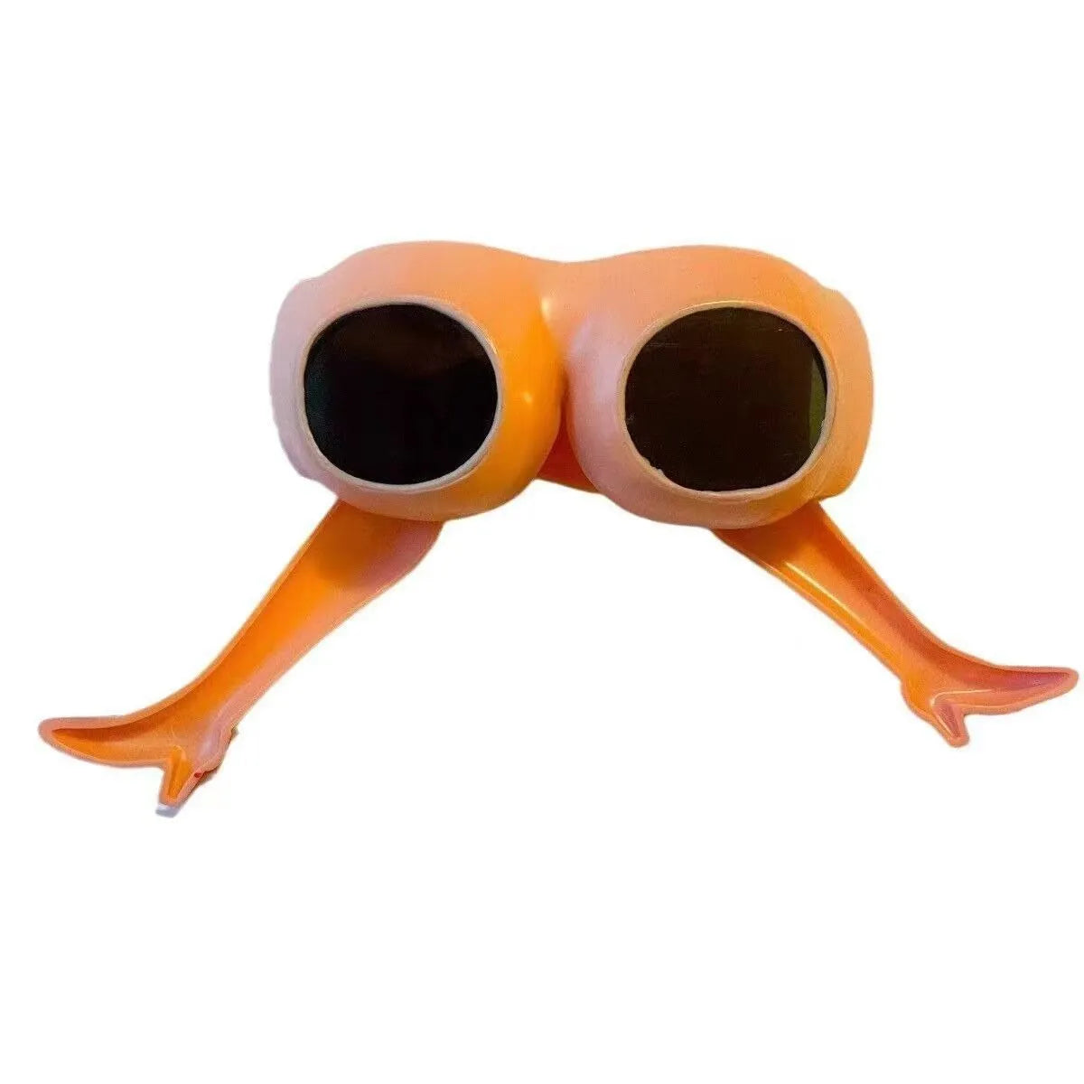 Orange plastic novelty sunglasses shaped like legs and hips on a white background.