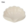 Plastic shell soap dish in Pearl White or Cherry Blossom Pink measuring 12x9x5.5cm for bathroom use
