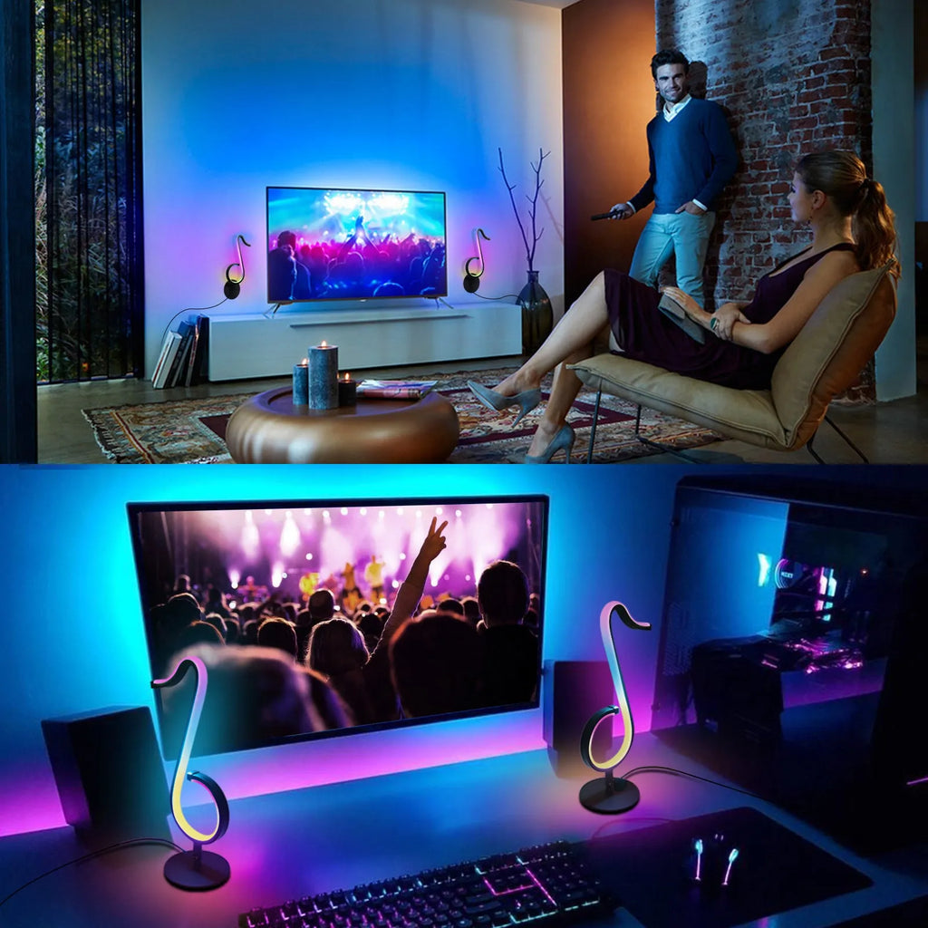 Black intelligent APP remote control LED atmosphere night light with 180 degree rotating chassis on a desk
