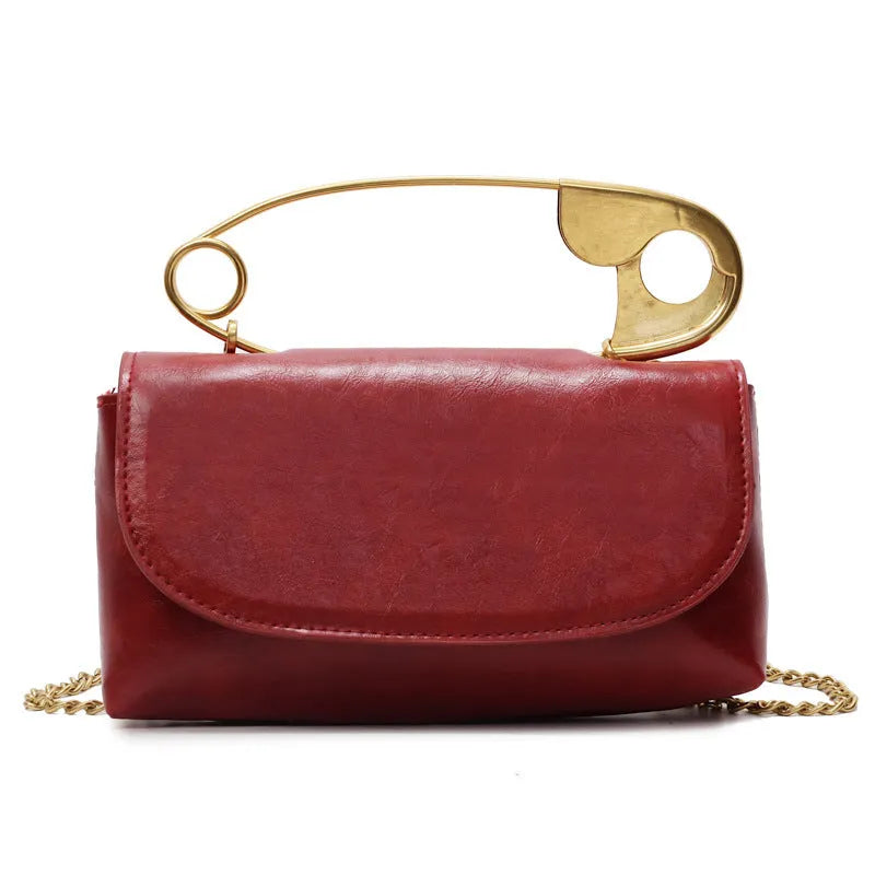 Creative paper clip shoulder handbag in PU leather with sewing thread detail, horizontal square shape