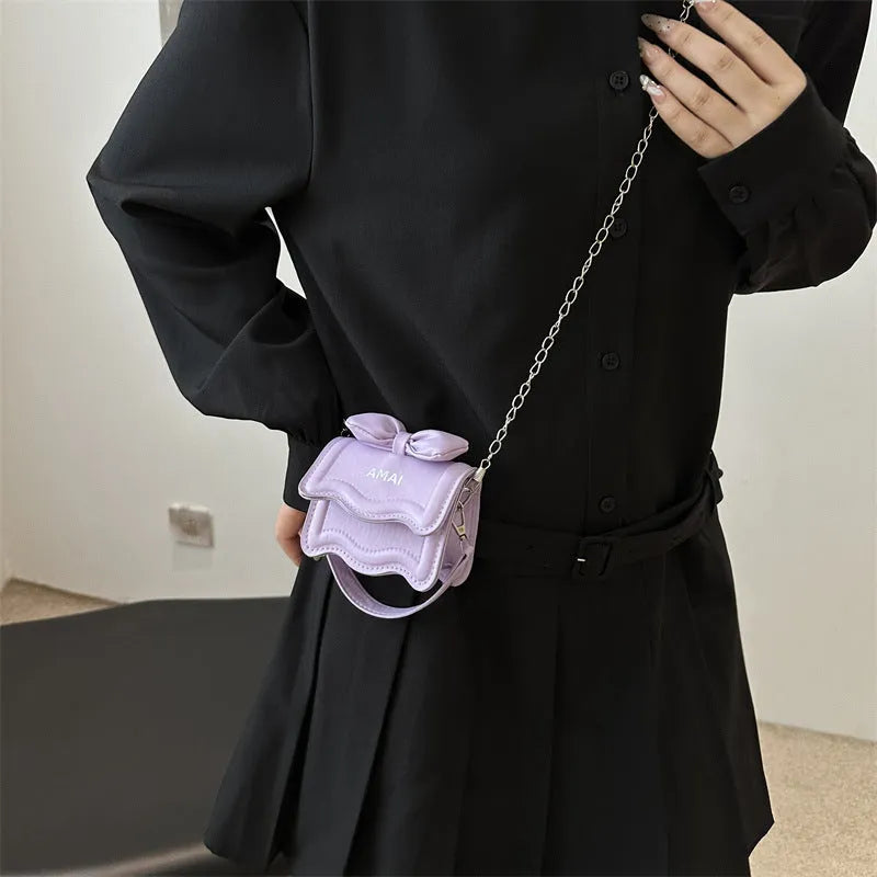 Women's mini crossbody bag in PU leather, available in several colour options with single strap