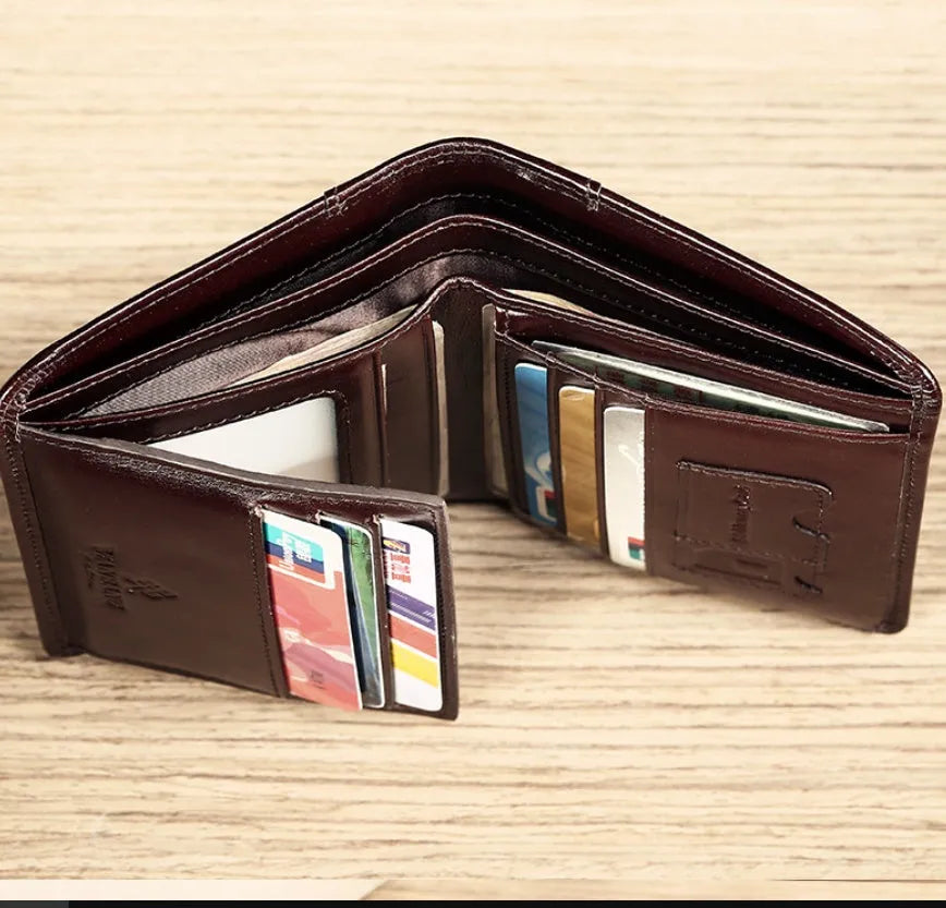 Men's black or brown leather wallet open to show photo window, card slots, and coin pocket.