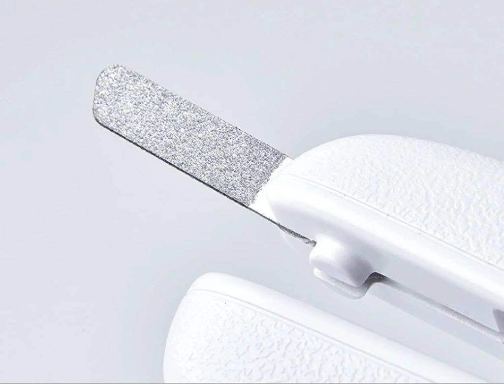 White pet nail clippers with LED light, transparent anti-splash guard, and a leather-like handle.