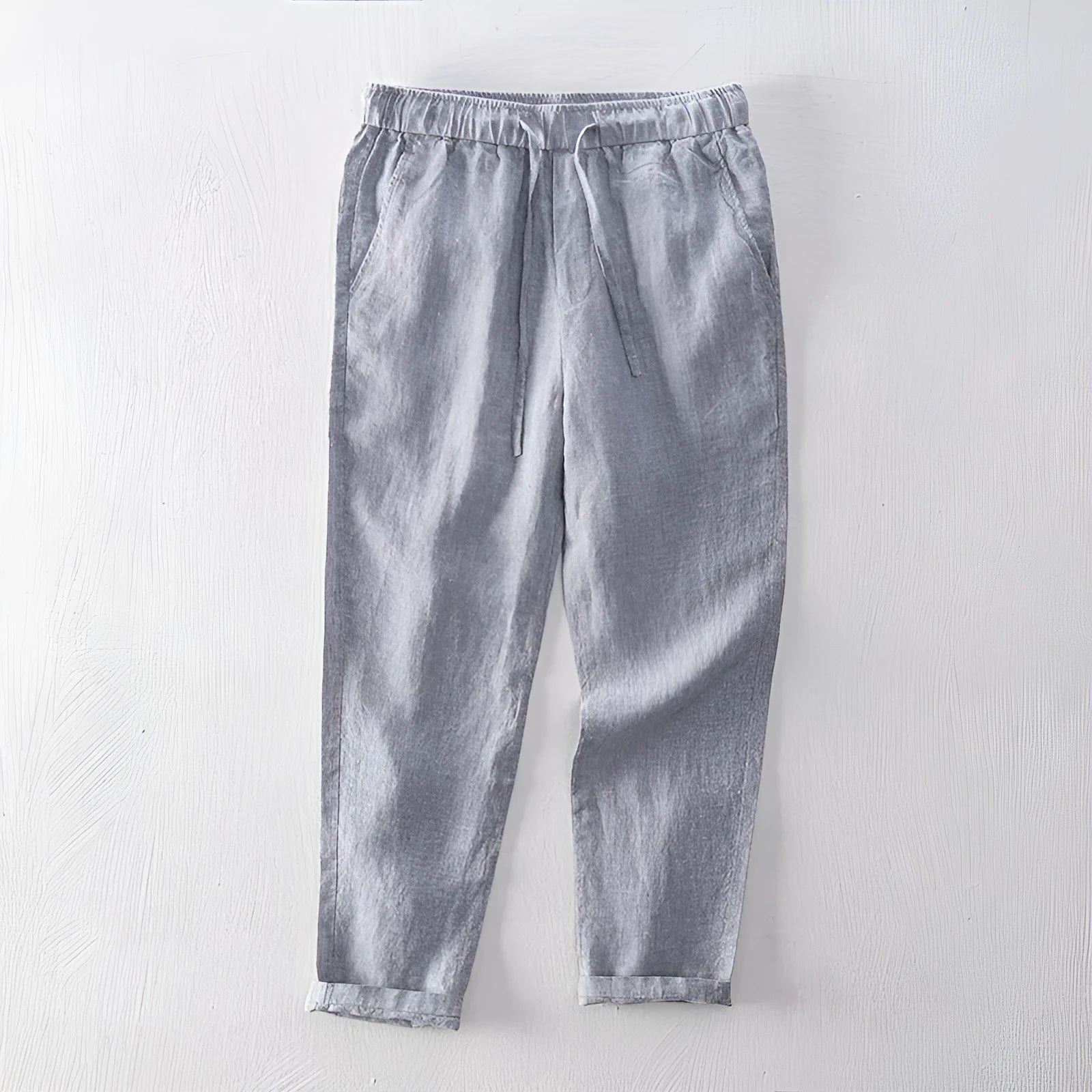Linen breathable straight trousers for men in khaki colour, mid-waist cut on white background