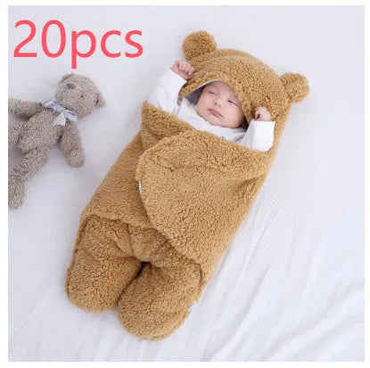 Baby quilted sleeping bag wrapper in cotton blend fabric with polyester cotton filling, shown in one of six colours