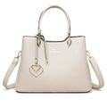 Women's black PU messenger bag with cross-body strap and multi-layer interior compartments.