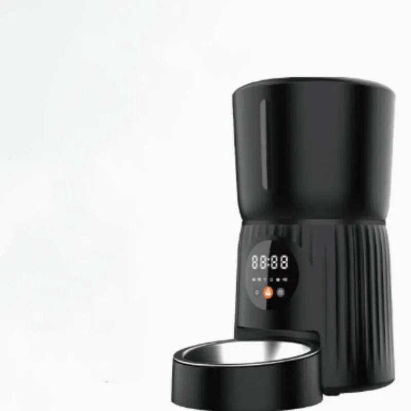 Black and white automatic pet feeder with digital timer display and USB cable