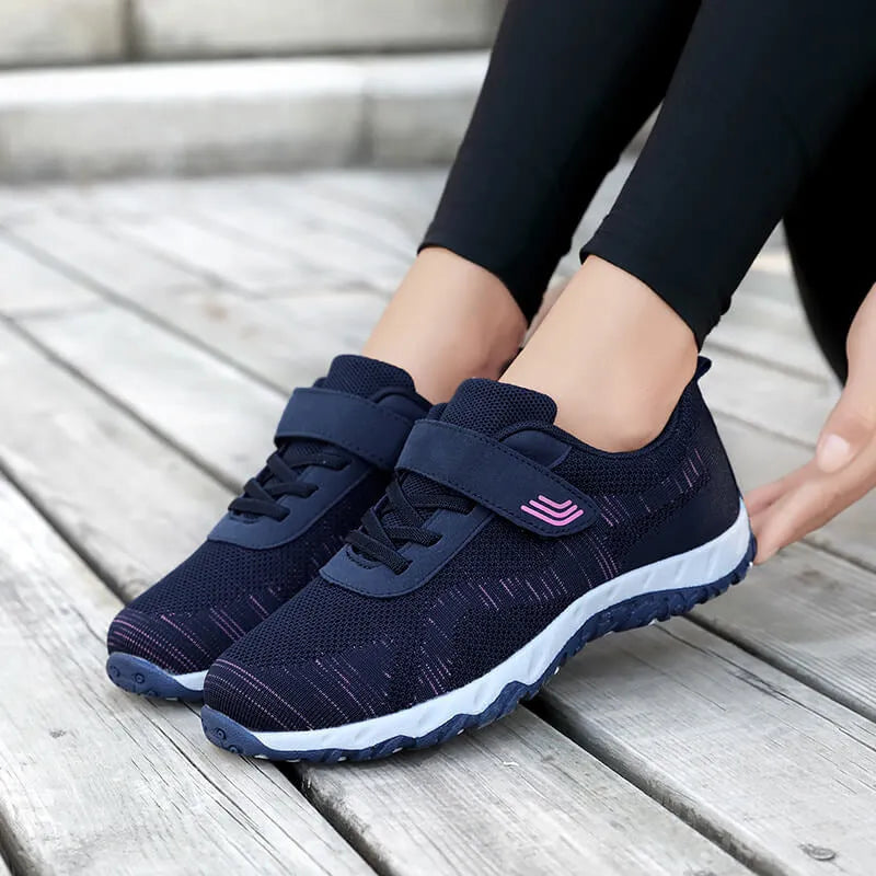 Women's grey purple wedge shoes with mesh upper and velcro closure, showing round toe and soft composite sole.