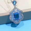 Sea blue mirror finish copper geometry pendant without chain, shown on neutral background